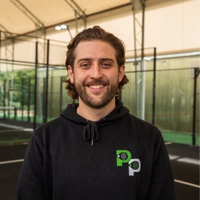 Alex of Padel Pass, courtside in Padel Pass kit